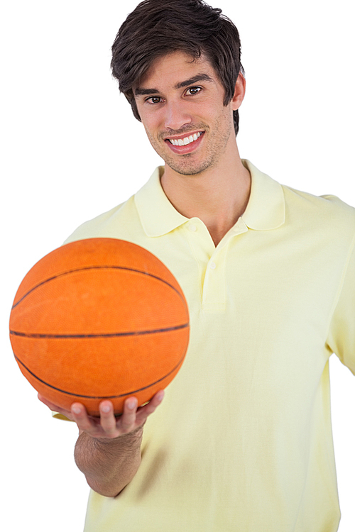 유토이미지 Portrait of a smiling man holding basket ball