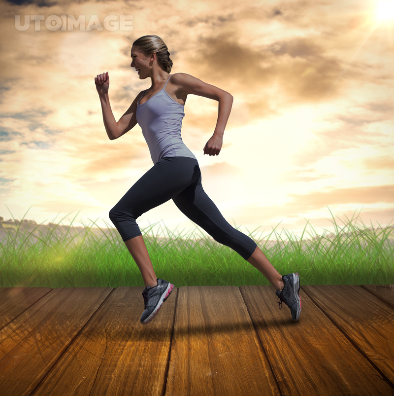 Composite Image Of Pretty Fit Blonde Jogging