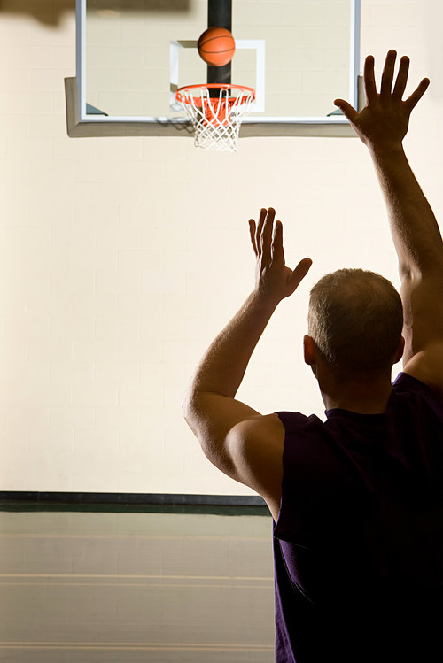 Man playing basketball