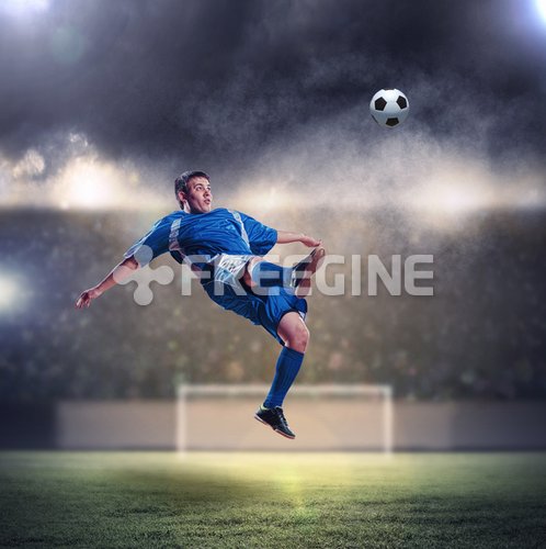 football player striking the ball 