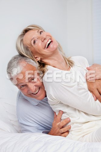 Senior Couple Laughing Together 