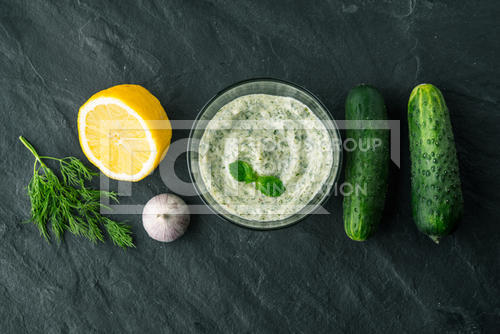 유토이미지 | Tzatziki On The Dark Stone Table With Ingredients Top View