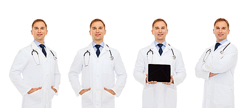 medicine, profession, technology and health care concept - happy doctors with tablet pc computer and stethoscope