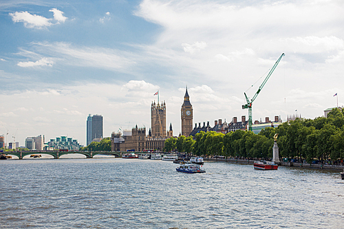 England, London - Big Ben, the Houses of Parliament and Westminster bridge over Thames river