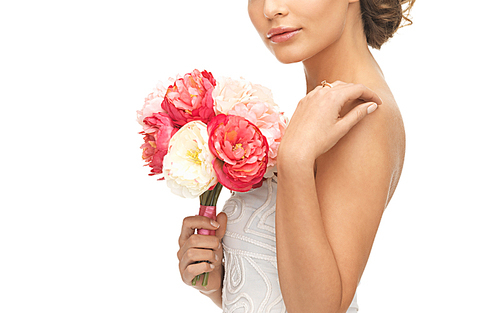 close up of young woman with bouquet of flowers.