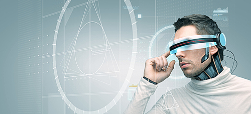 people, technology, future, engineering and progress - man with futuristic 3d glasses and microchip implant or sensors over gray background with golden section on virtual screen