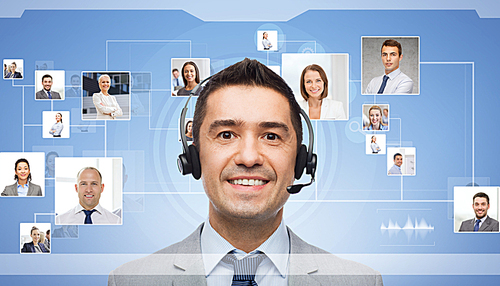 business, people, technology, communication and service concept - smiling businessman in headset and contacts icons on virtual screen over blue background