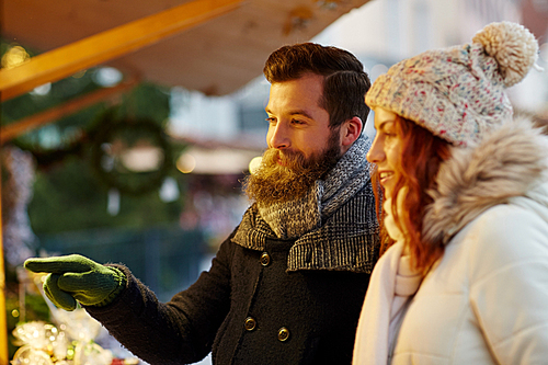 holidays, winter, christmas and people concept - happy couple in warm clothes outdoors