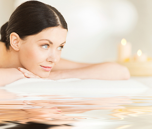 picture of happy relaxed woman in spa salon