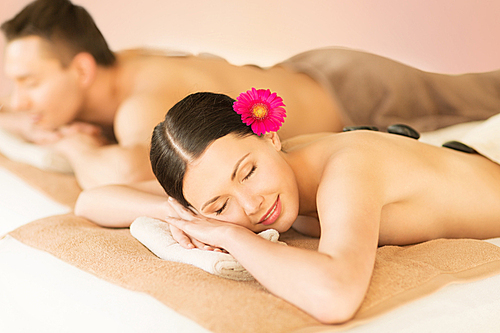 picture of couple in spa salon with hot stones