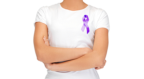 charity, people, health care and social issue concept - close up of woman with purple domestic violence awareness ribbon on her chest