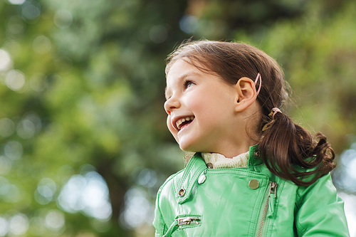 summer, childhood, happiness and people concept - happy beautiful little girl portrait outdoors