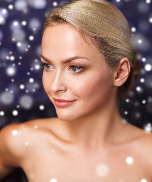 people, beauty, spa, healthy lifestyle and relaxation concept - close up of beautiful young woman at bath or sauna with snow effect
