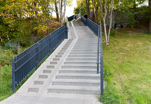 architecture concept - stair case with railings in autumn park