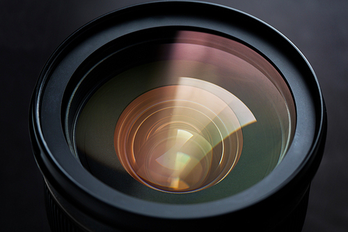 photography, object and art concept - close up of camera lens
