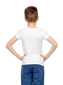 childhood, fashion, advertisement and people concept - boy in white t-shirt and jeans