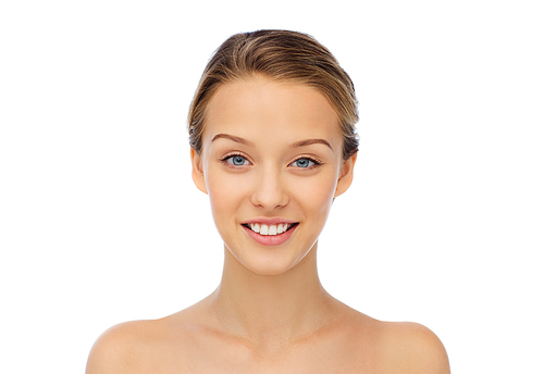 beauty, people and health concept - smiling young woman face and shoulders