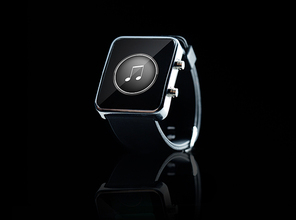 modern technology, media, object and media concept - close up of black smart watch with music note icon on screen over black background