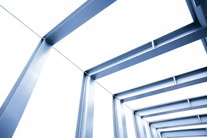 architecture and construction concept - close up of modern architectural construction