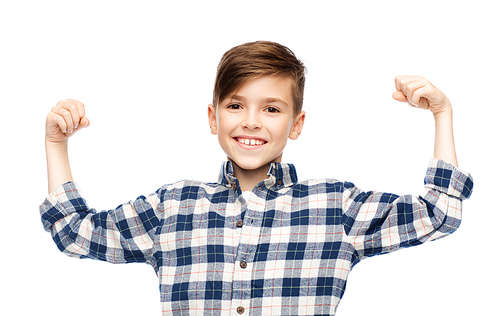 childhood, power, strength and people concept - happy smiling boy in checkered shirt showing strong fists