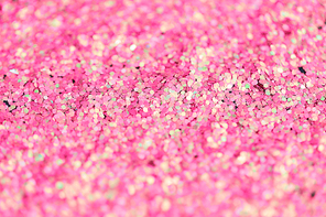 holidays, decoration and texture concept - pink glitter or sequins background