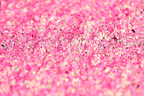 holidays, decoration and texture concept - pink glitter or sequins background