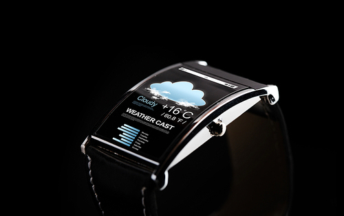 modern technology, weather cast, object and media concept - close up of black smart watch with forecast application icon