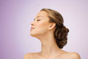 beauty, people and health concept - young woman face with closed eyes and shoulders side view over violet background