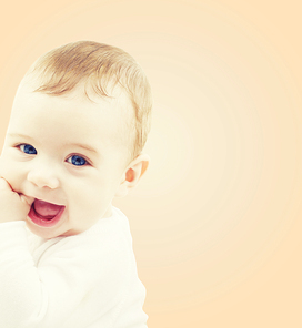 child, people and happiness concept - adorable baby boy