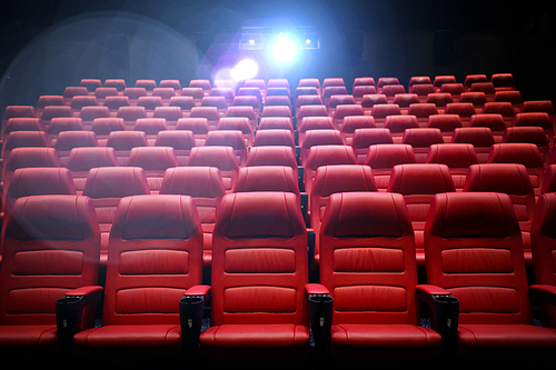 entertainment and leisure concept - movie theater or cinema empty auditorium with red seats