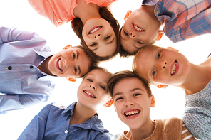 childhood, fashion, friendship and people concept - happy smiling children faces