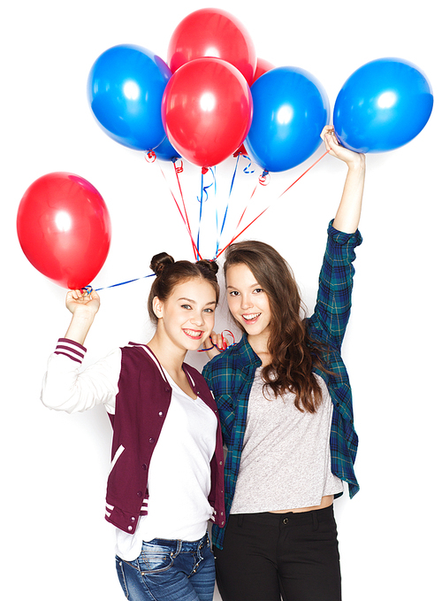 people, friends, teens, holidays and party concept - happy smiling pretty teenage girls with helium balloons