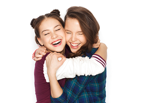 people, friends, teens and friendship concept - happy smiling pretty teenage girls hugging and laughing
