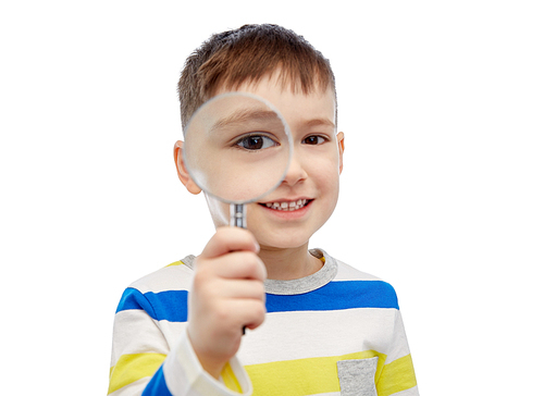 childhood, investigation, discovery, vision and people concept - happy little boy looking through magnifying glass