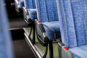 transport, tourism, road trip and equipment concept - travel bus interior and seats