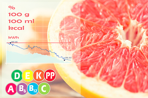 healthy eating, food, fruits and diet concept - close up of fresh juicy grapefruit slice on table with calories and vitamin chart