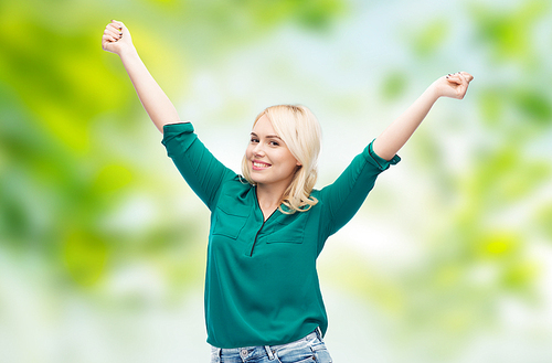 female, summer, joy, plus size and people concept - happy young woman in shirt and jeans over green natural background