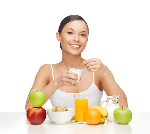 picture of young woman eating healthy breakfast