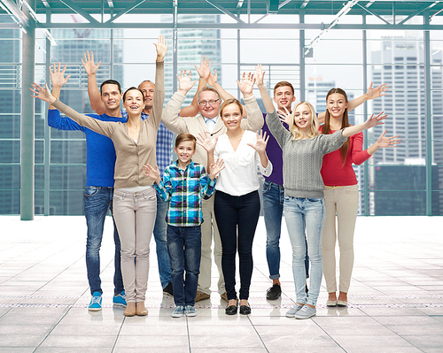 family, gender, generation and people concept - group of smiling men, women and boy waving hands over terminal with window city view background