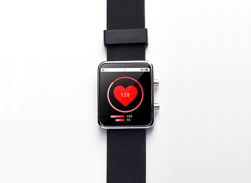 modern technology, health care, object and media concept - close up of black smart watch with heart-rate on screen