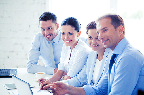 friendly business team having meeting in office