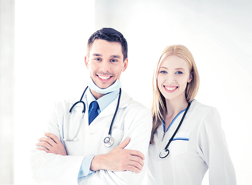 bright picture of two young attractive doctors