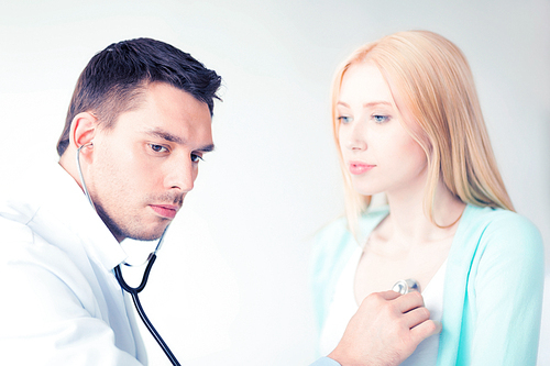 bright picture of male doctor with patient