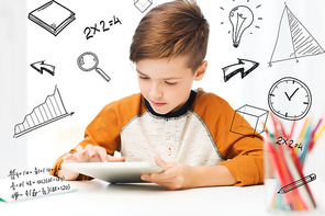 leisure, children, technology and people concept - close up of boy with tablet pc computer at home over mathematical doodles