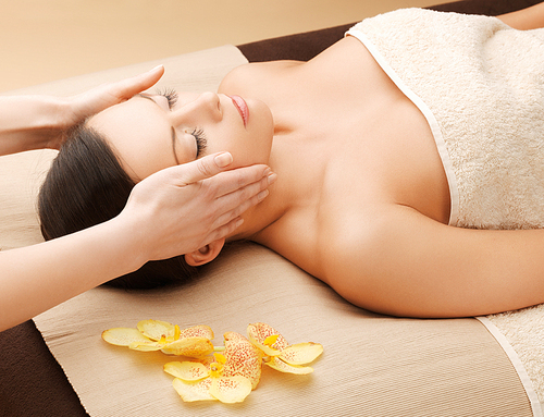 picture of happy beautiful woman in massage salon