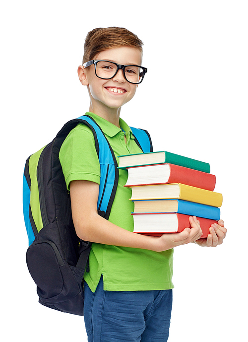 childhood, school, education and people concept - happy smiling student boy in eyeglasses with school bag and books