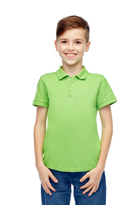 childhood, fashion and people concept - happy smiling boy in green polo t-shirt