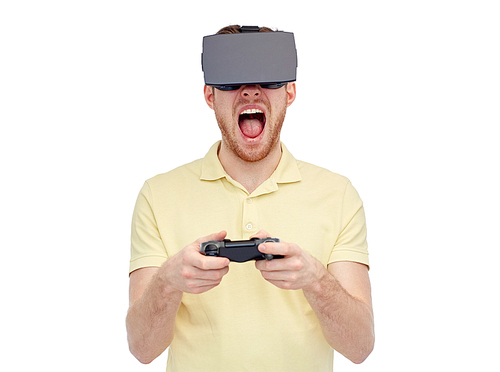 3d technology, virtual reality, entertainment and people concept - young man with virtual reality headset or 3d glasses playing with game controller gamepad and screaming