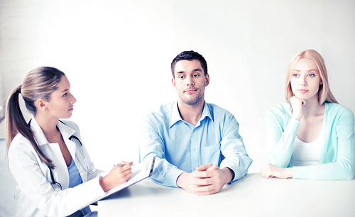 bright picture of doctor with patients in cabinet