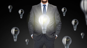 business, inspiration, startup, idea and people concept - close up of businessman in suit with ligh bulb icons